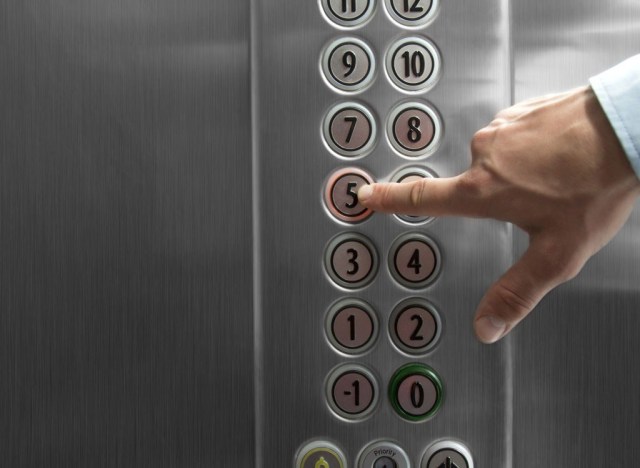 pressing elevator buttons