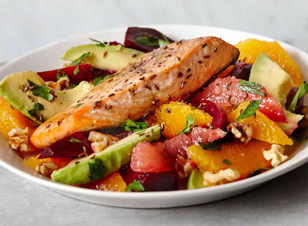 Whole piece of salmon over fruits - best ways to speed up your metabolism 