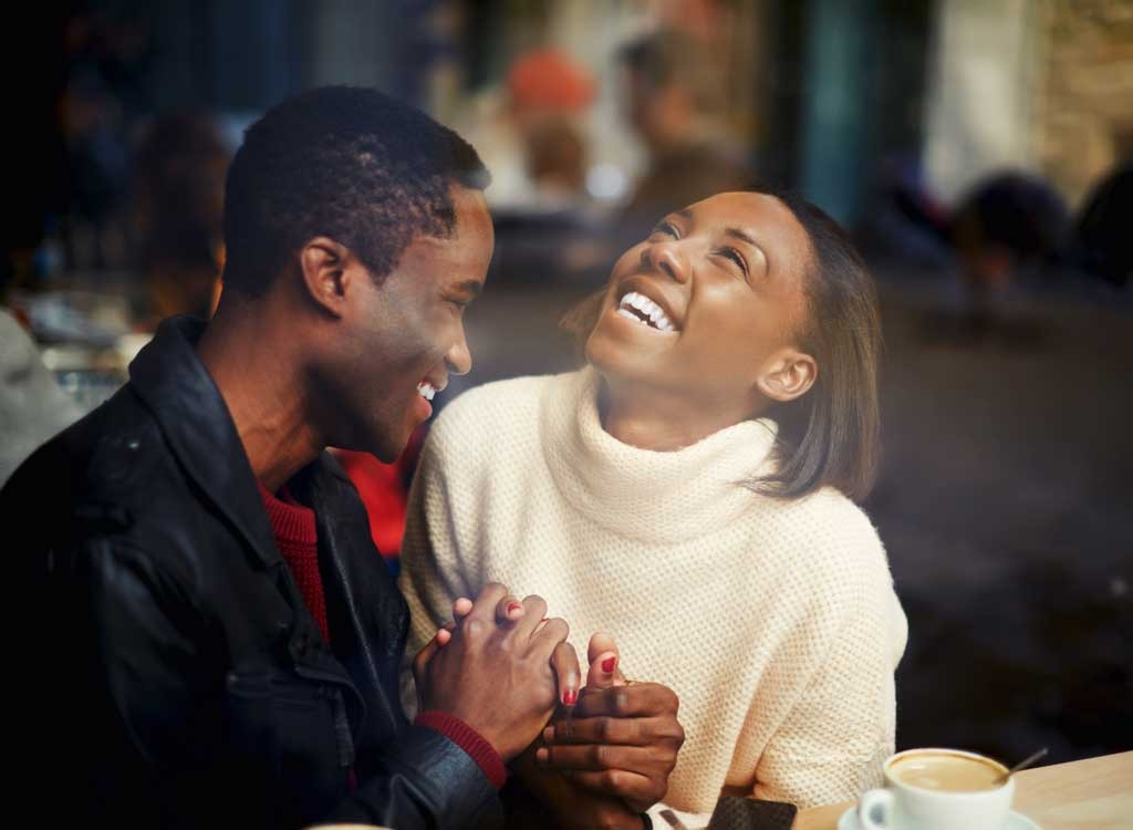 Happy couple smiling lauging together - best ways to speed up your metabolism 