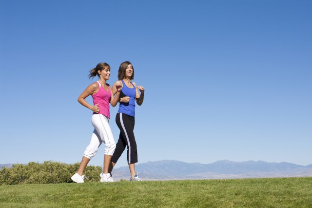 two women walking fast