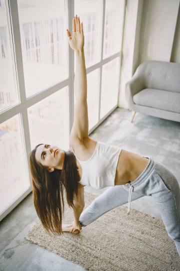 practicing yoga at home