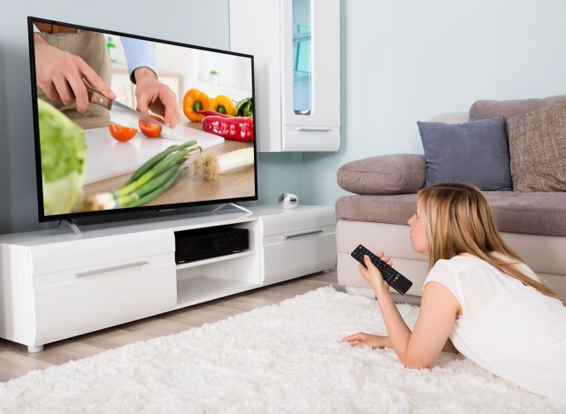 woman watching food show on tv