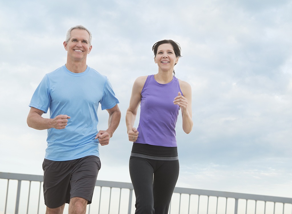 Older couple running