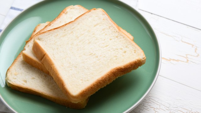 slices white bread on plate