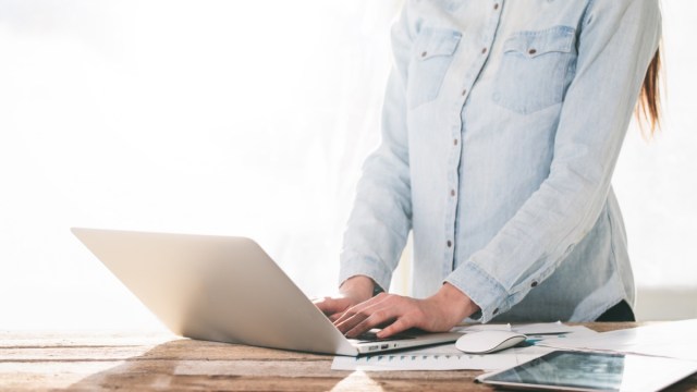 woman using standing desk