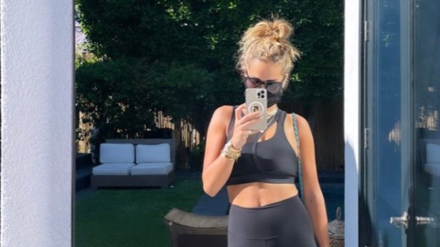 rita ora taking selfie in workout gear