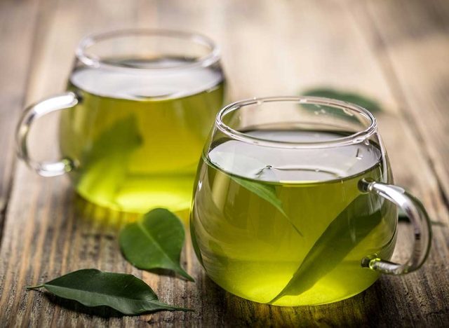 Green tea in mugs