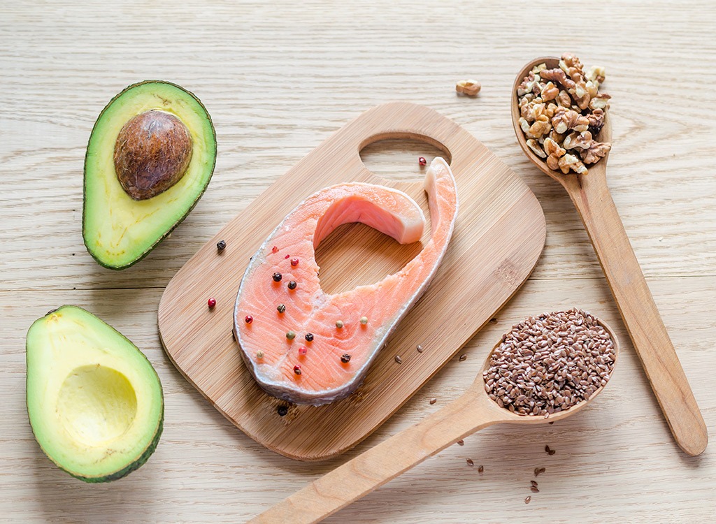 Avocado salmon nuts spoon