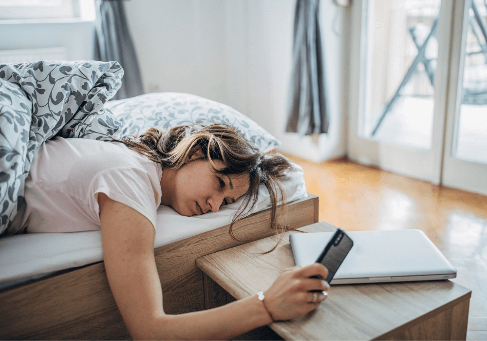 woman resting in bed happy Sunday blessings