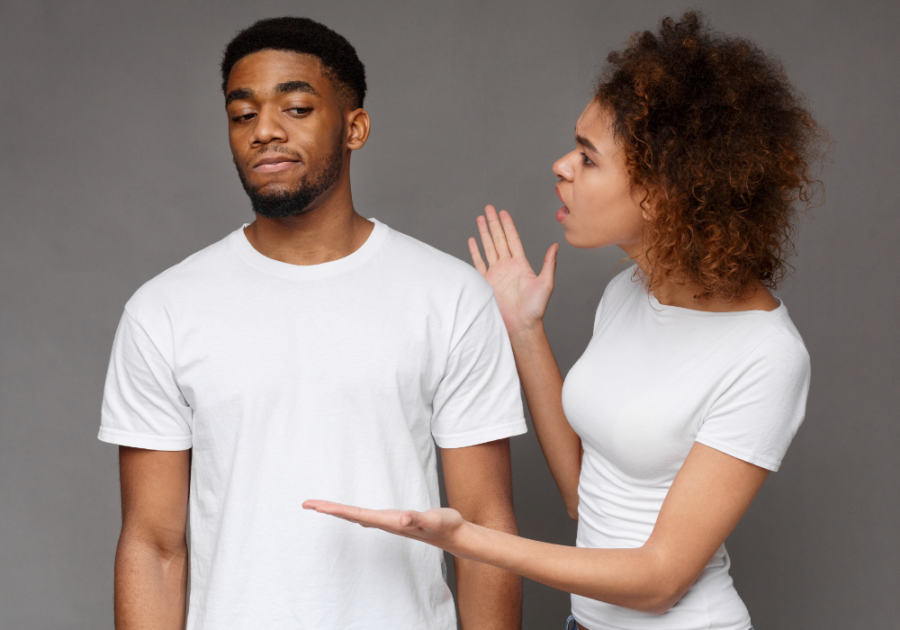 woman explaining something to boyfriend what age does a man emotionally mature