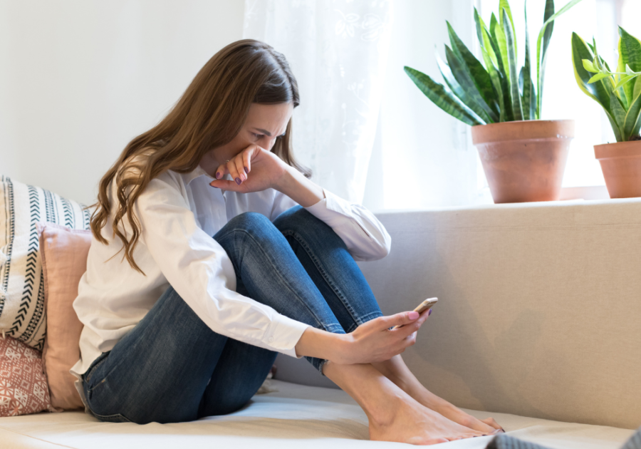 woman crying after reading texts what ghosting says about you